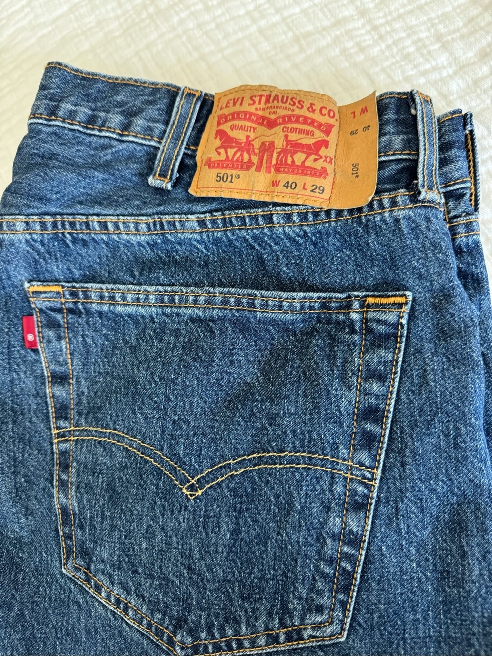 Levi's 501 button fly Denim Jeans in Dark Blue with Yellow Stitching